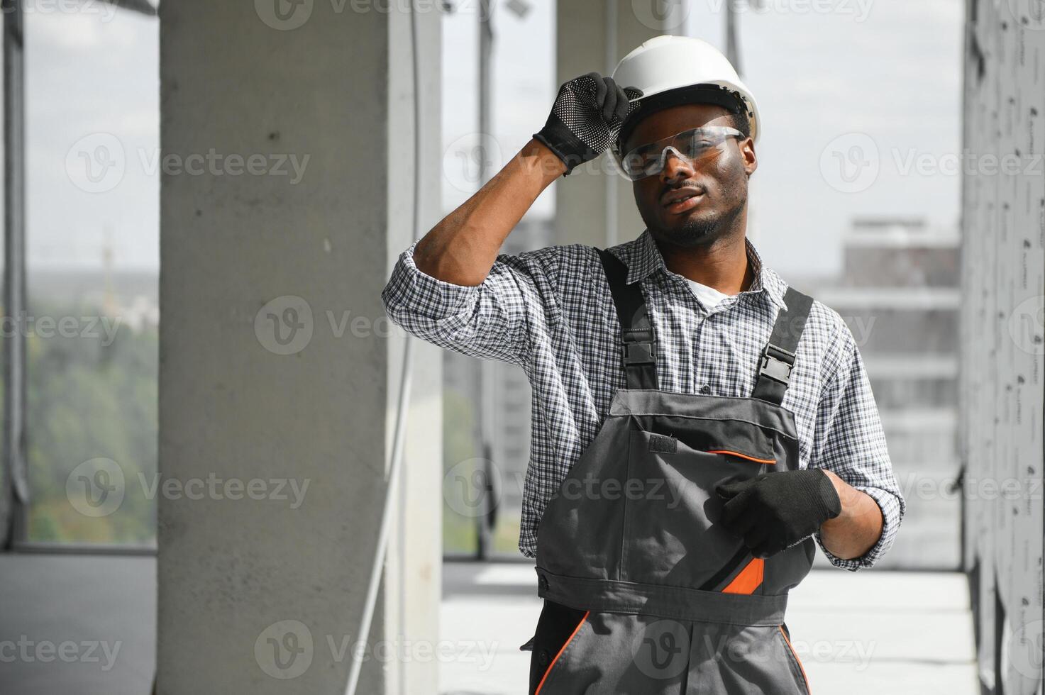 portrait of an African American construction worker on location photo