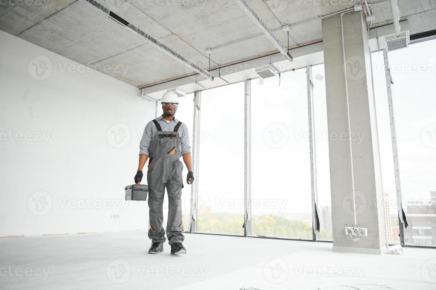 portrait of an African American construction worker on location photo