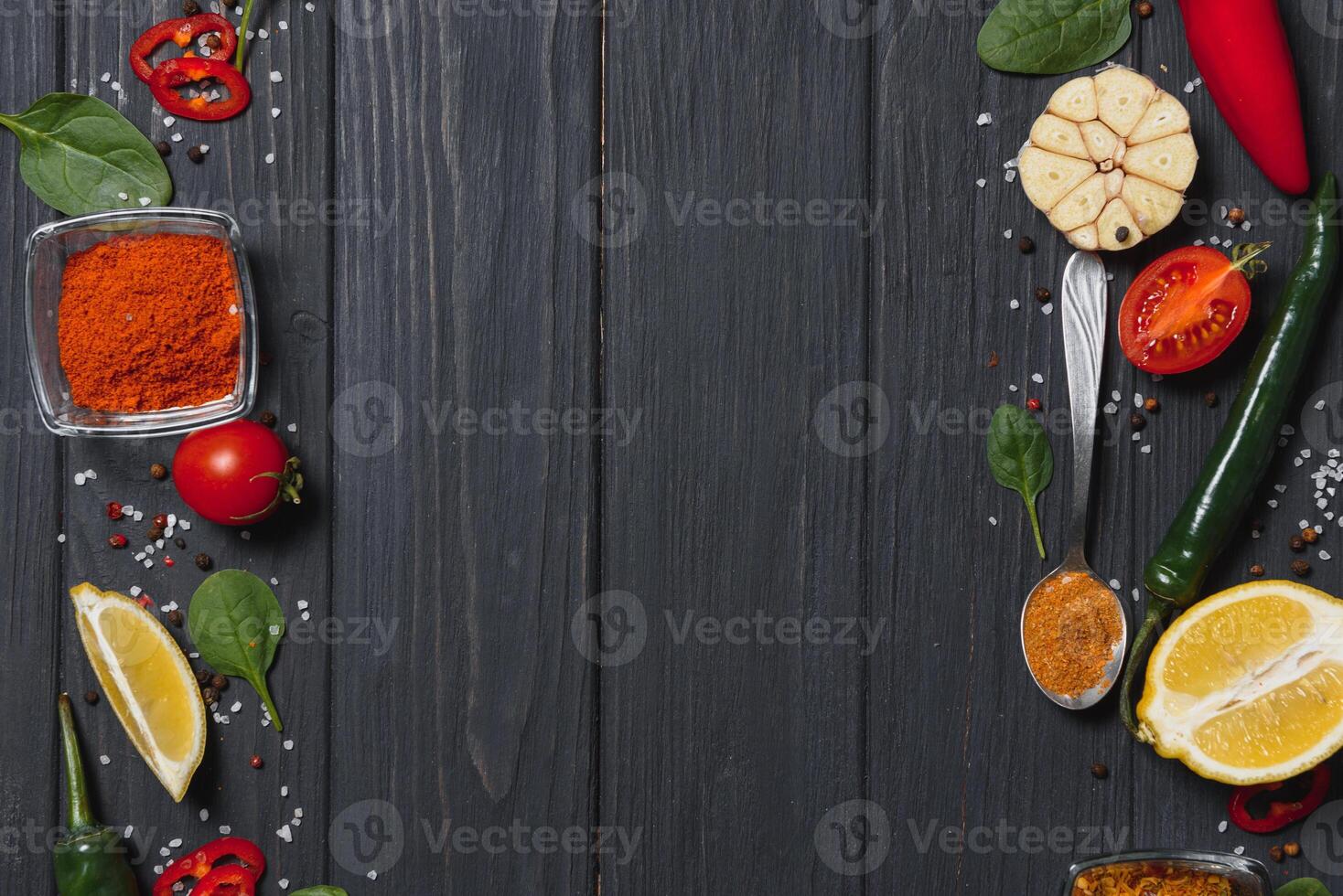 Spices and herbs over wooden background, healthy or cooking concept photo
