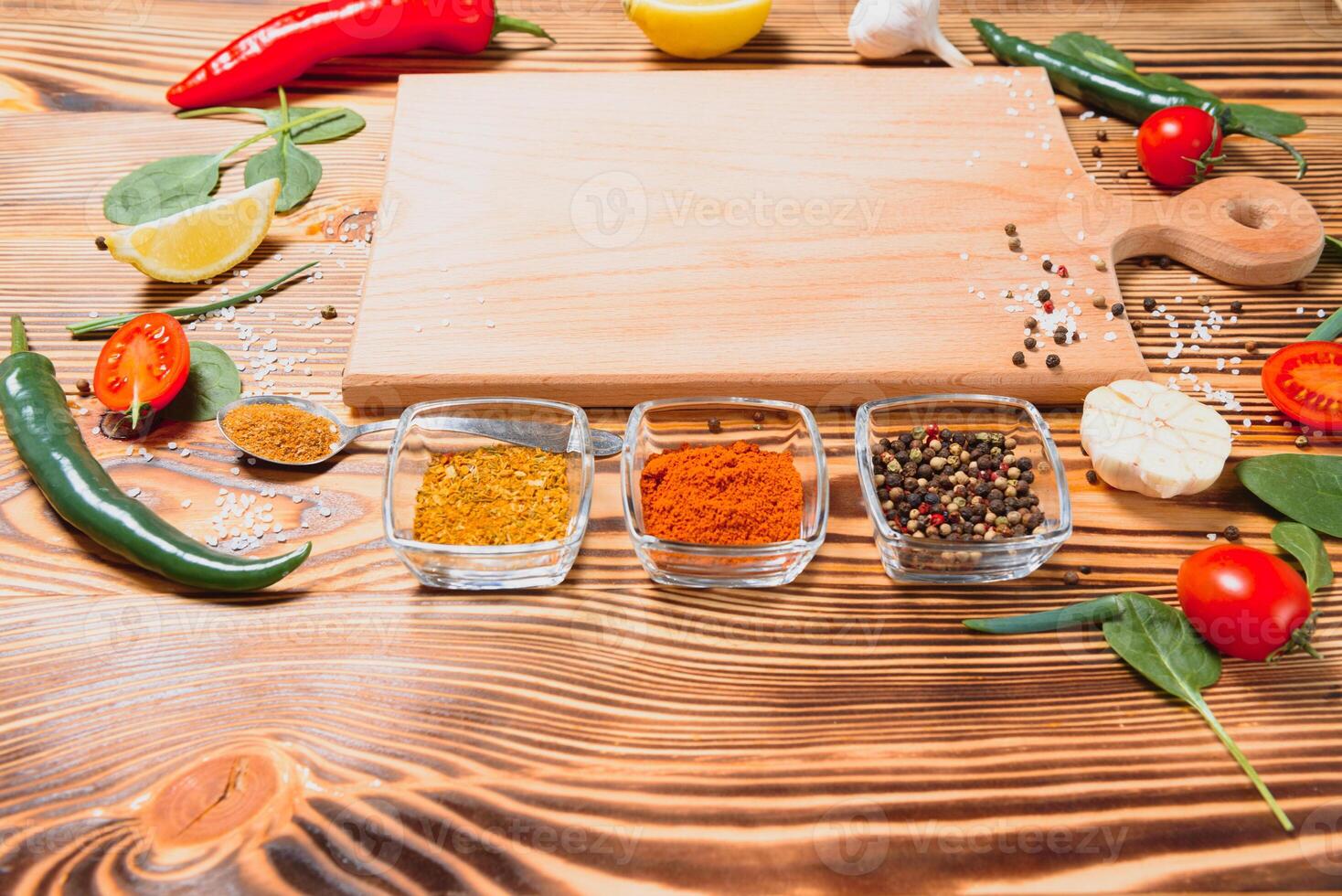 Cooking table. Background with spices and vegetables. Top view. Free space for your text photo