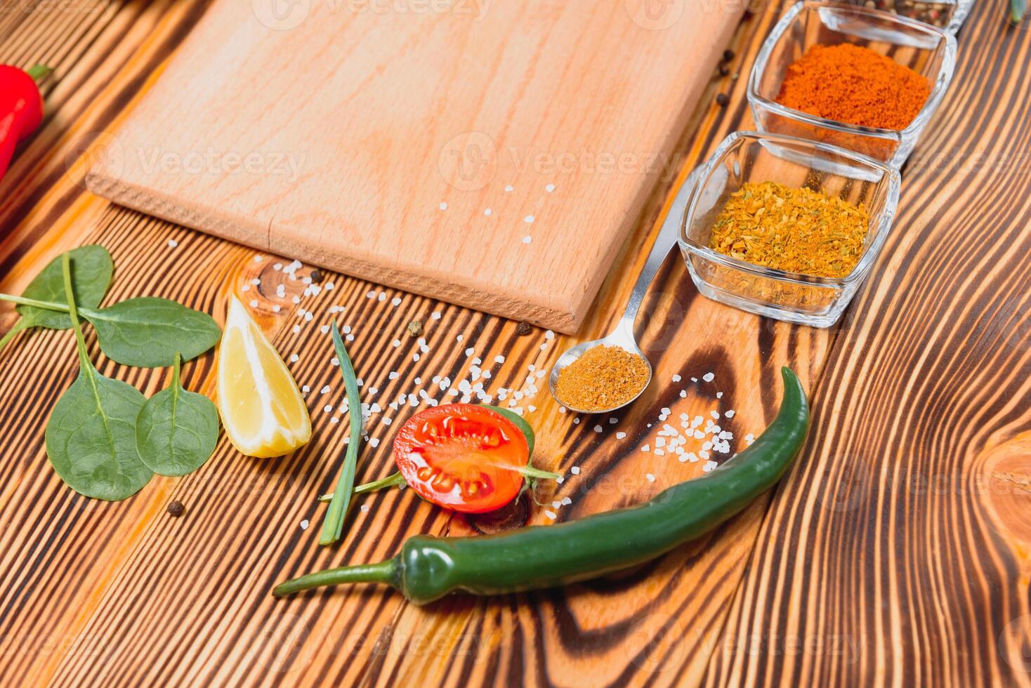 Cooking table. Background with spices and vegetables. Top view. Free space for your text photo