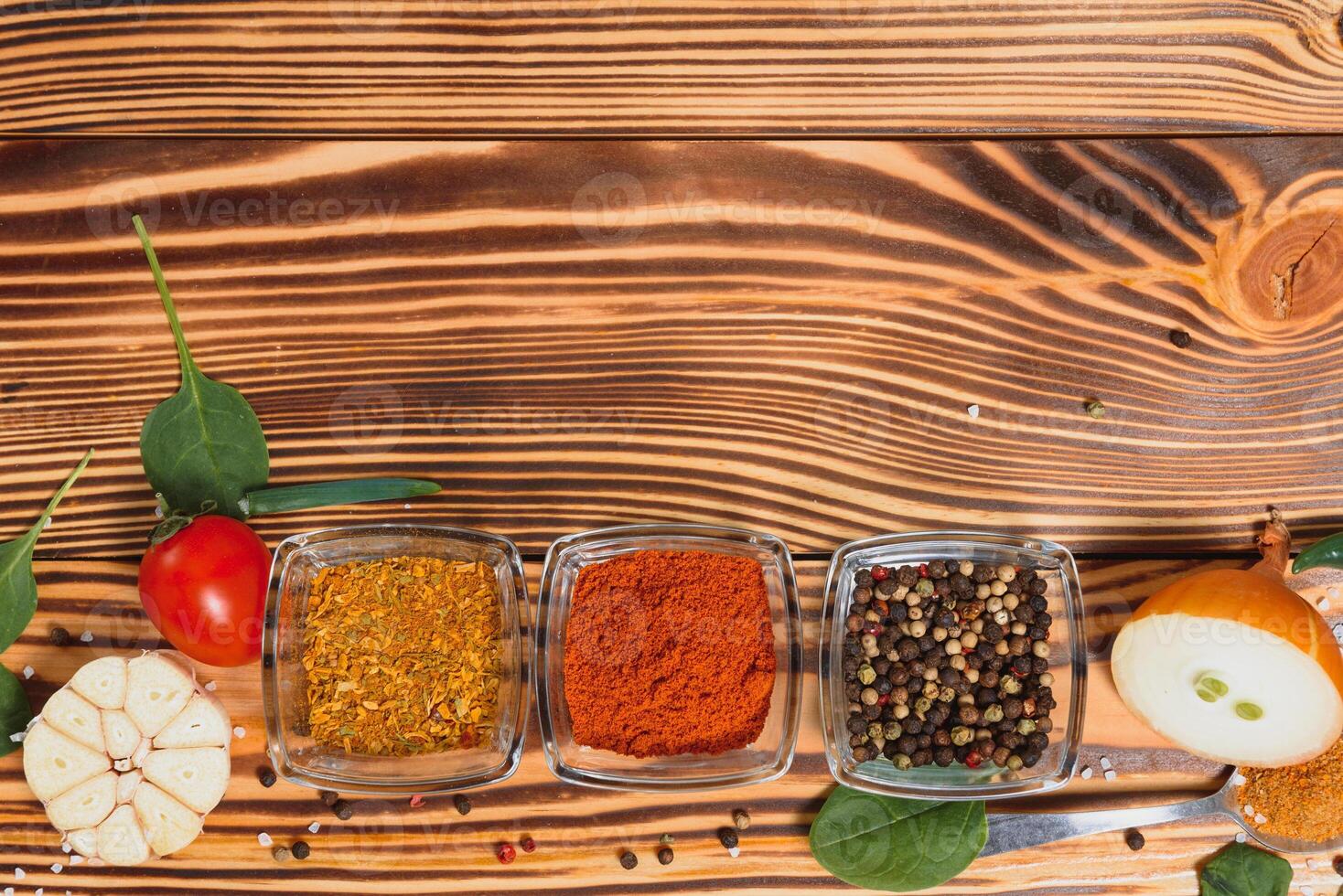 Cooking table. Background with spices and vegetables. Top view. Free space for your text photo