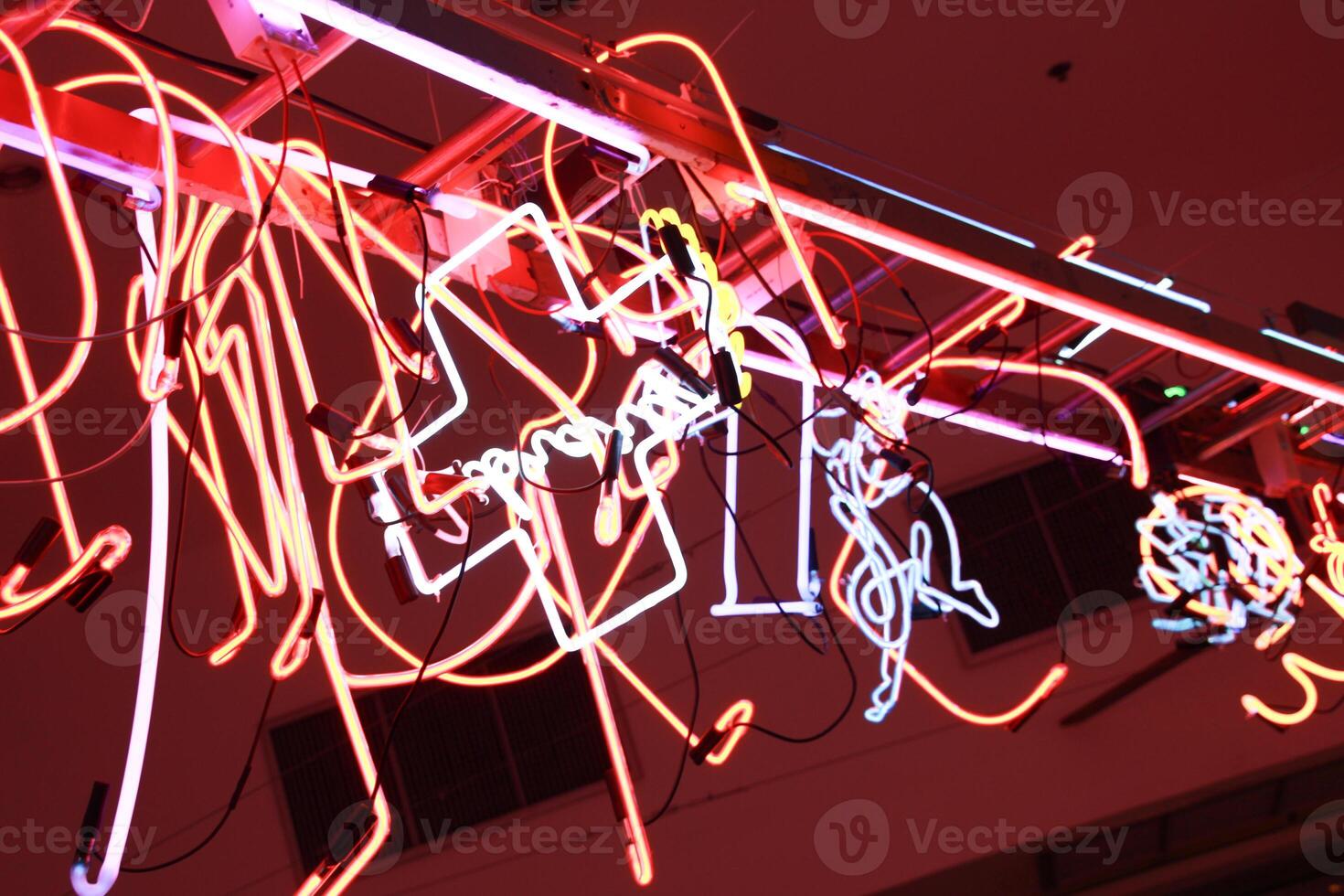 close up bokeh light of colorful wire shape flying photo