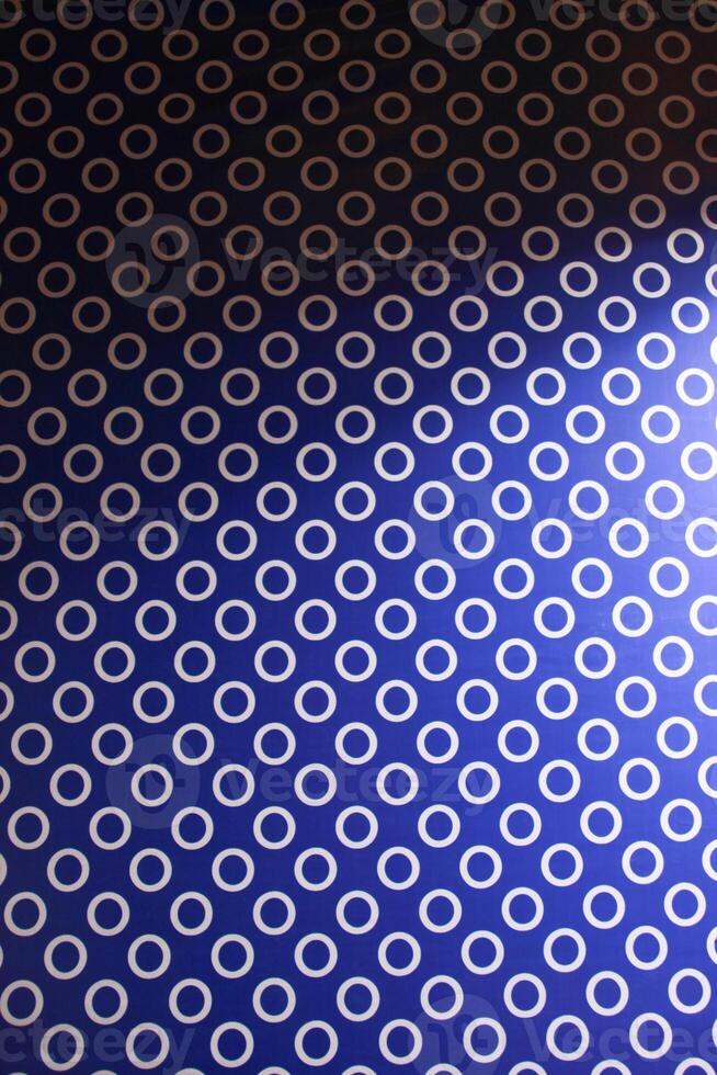 red and blue background with a dot pattern photo