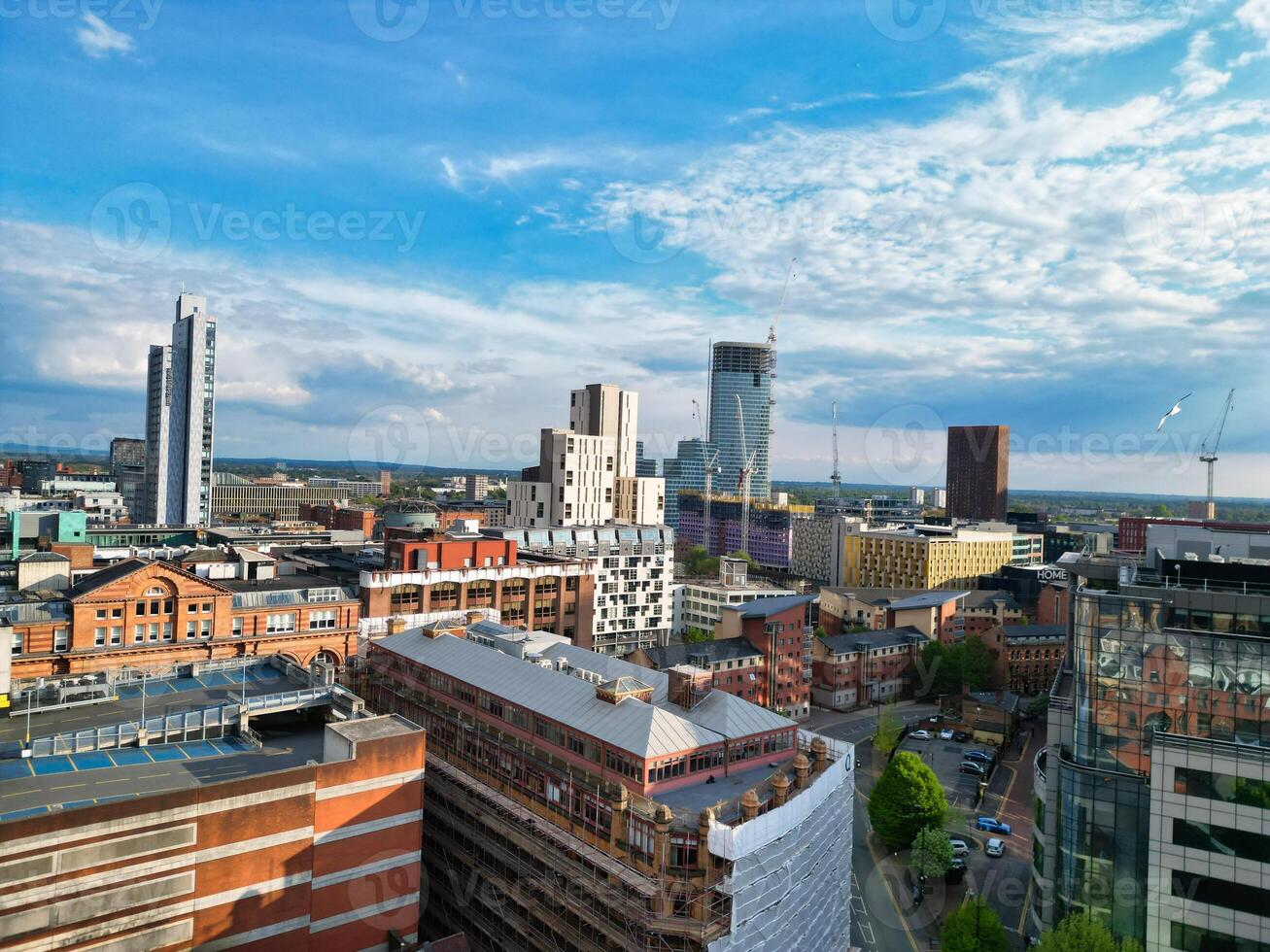 High Angle View of Greater Manchester City Centre Buildings During Beautiful Sunny day over England UK. May 5th, 2024 photo