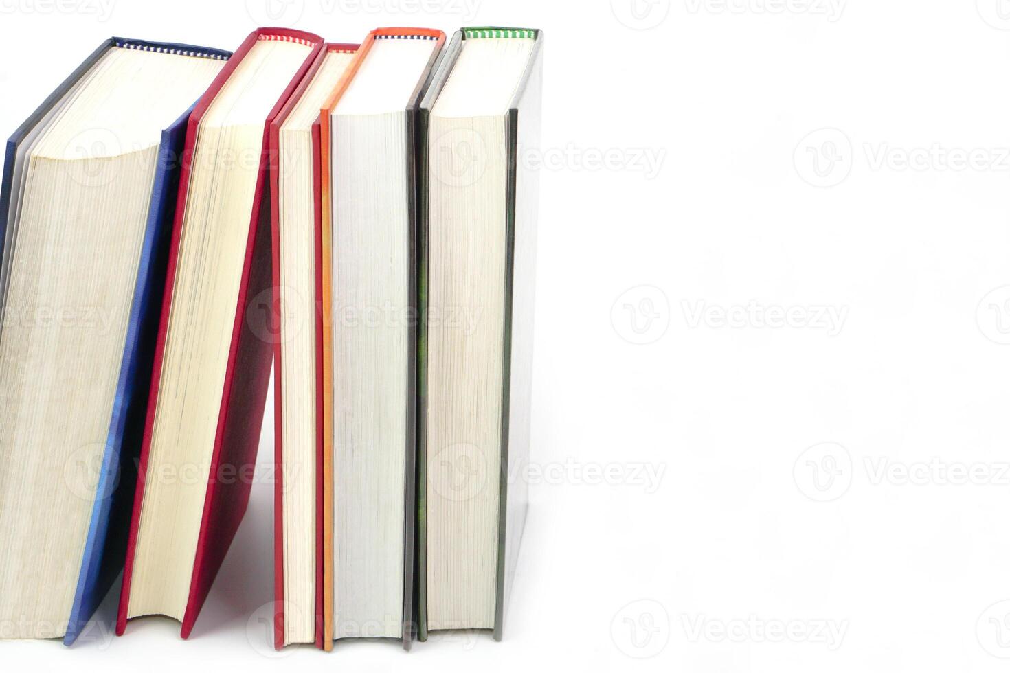 Stack of books on white background.Knowledge, learning and education concept. photo