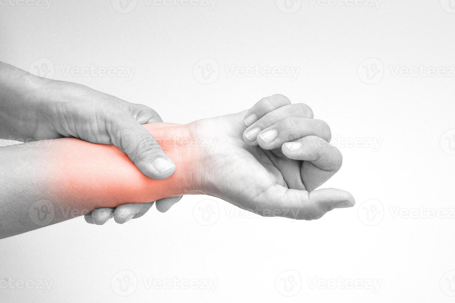 Woman with pain in wrist on white background with clipping path. Healthcare and office syndrome concept. photo