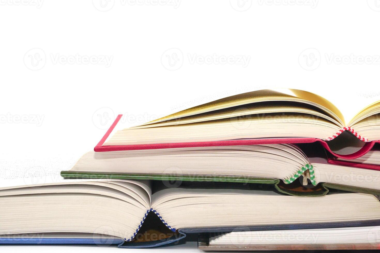 Stack of open books and stacked together. Knowledge and education concept. photo