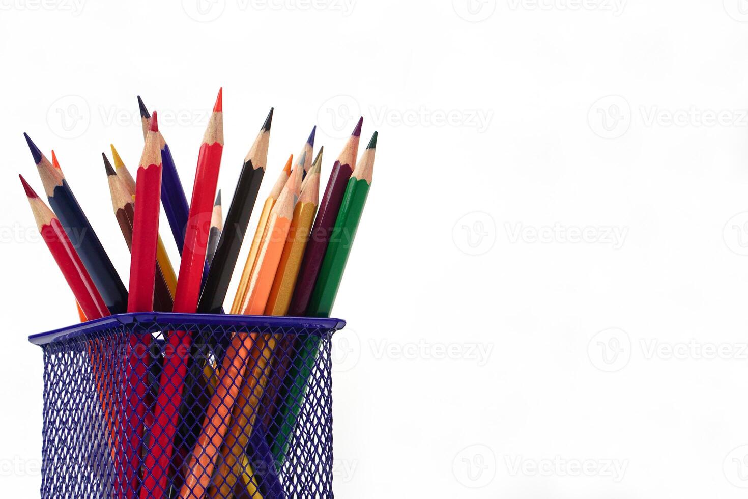 Crayon or colored pencils in box on white background. Knowledge and education concept. photo