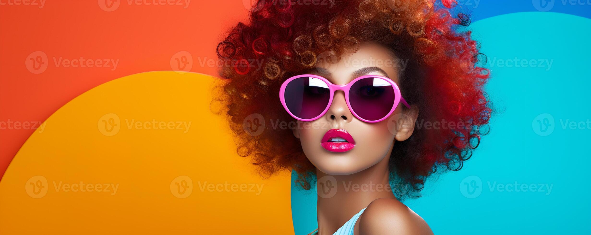 a woman with sunglasses and a colorful background photo