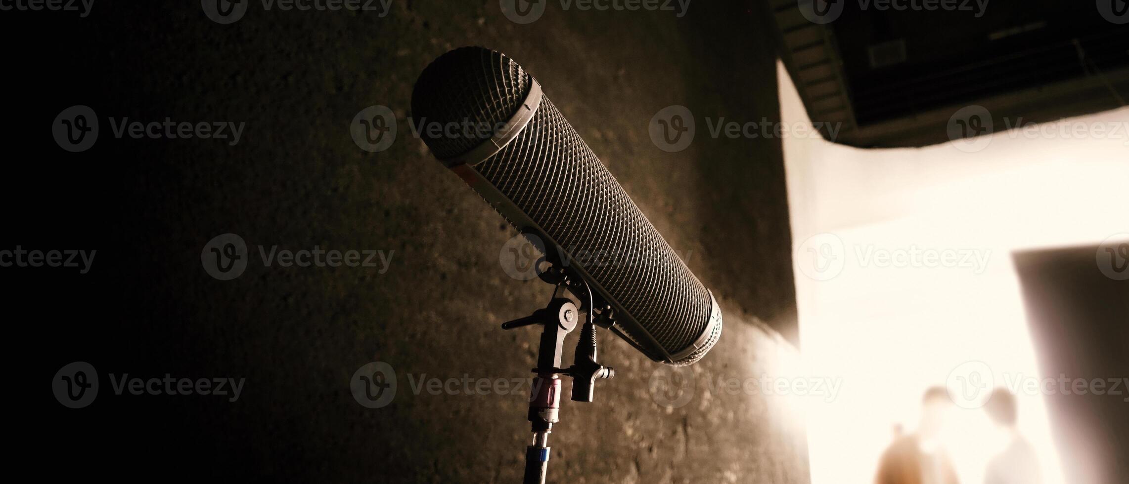 Boom Microphone on stand in Production which recording audio and ambient sound in studio. photo
