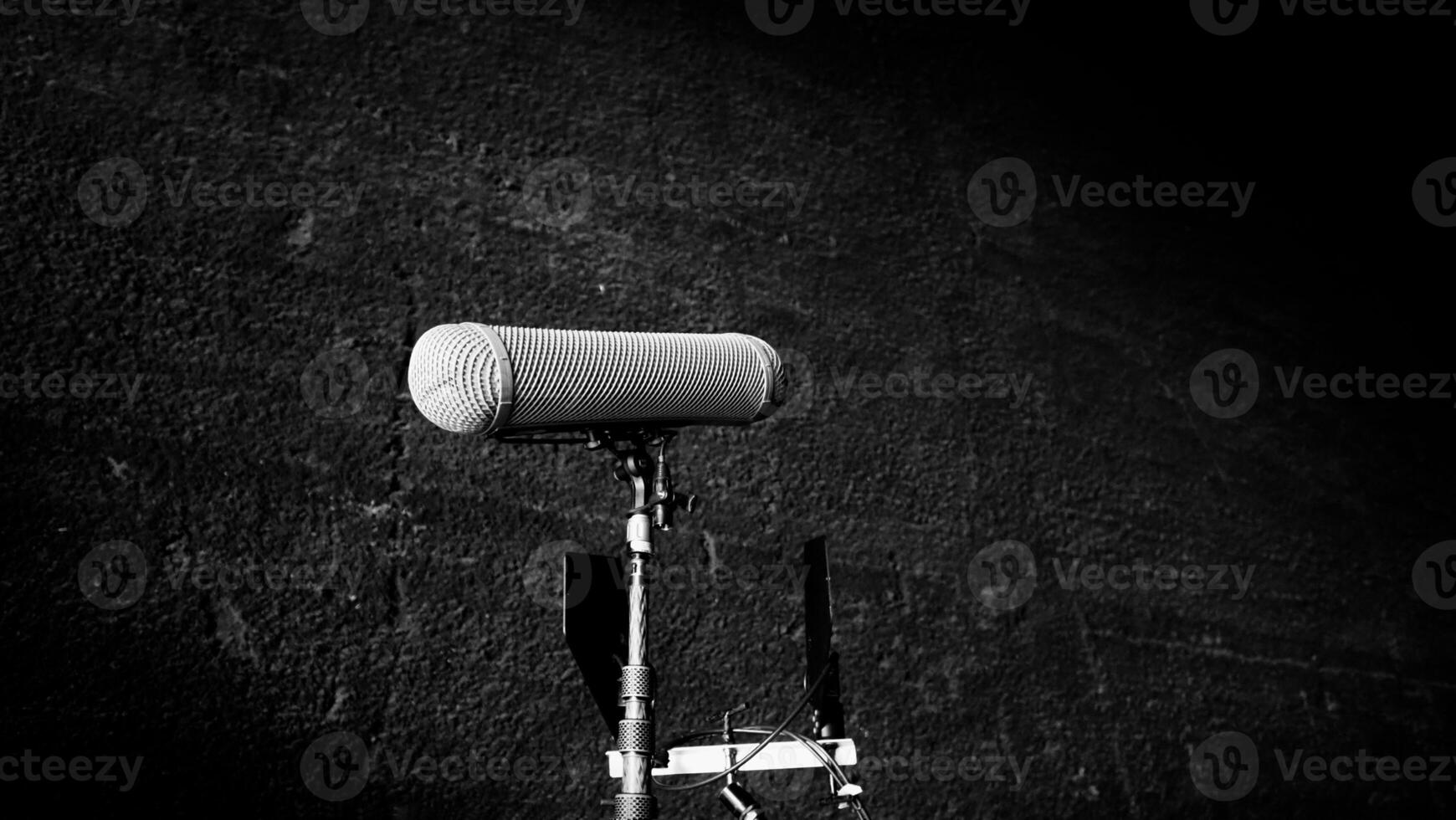 Boom Microphone on stand in Production which recording audio and ambient sound in studio. photo