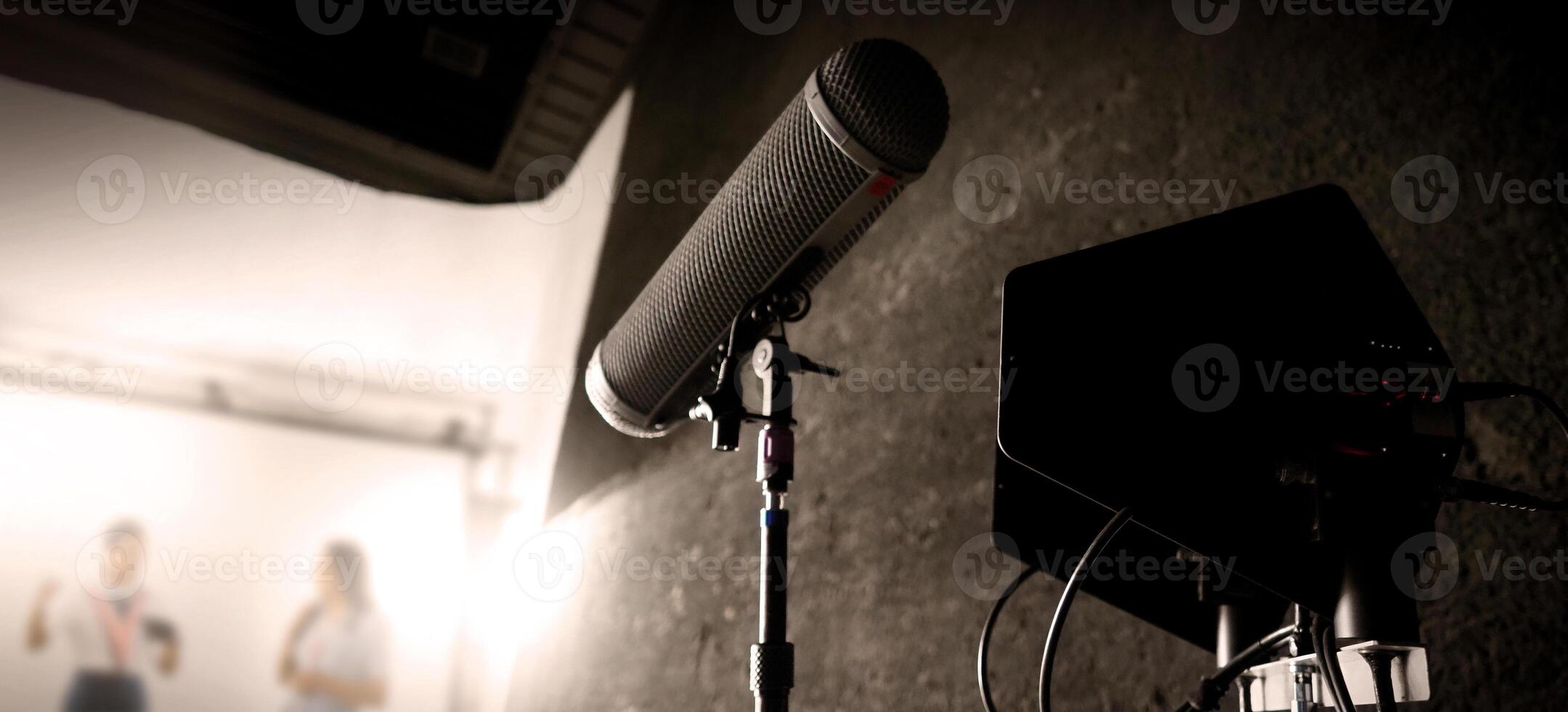 Boom Microphone on stand in Production which recording audio and ambient sound in studio. photo