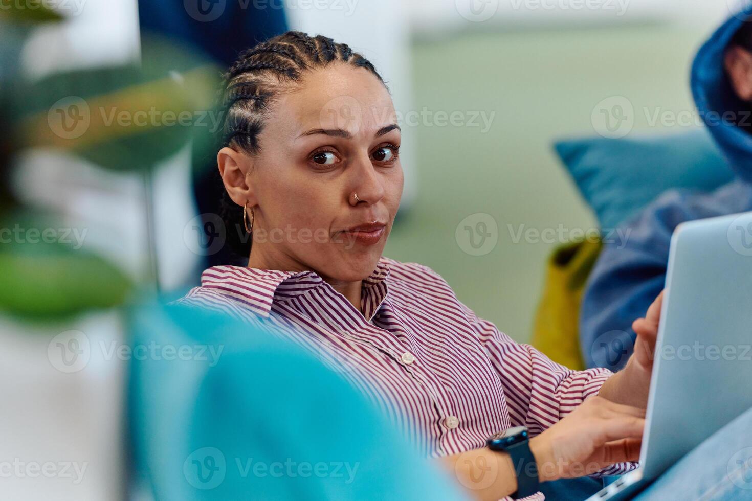 A modern programmer discussing future business projects with colleagues in a modern startup office photo