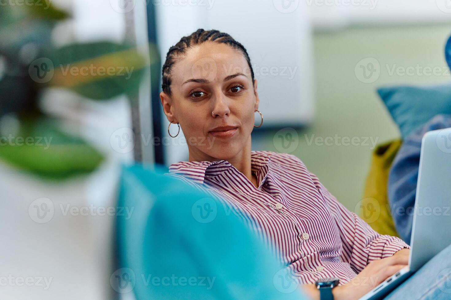 A modern programmer discussing future business projects with colleagues in a modern startup office photo