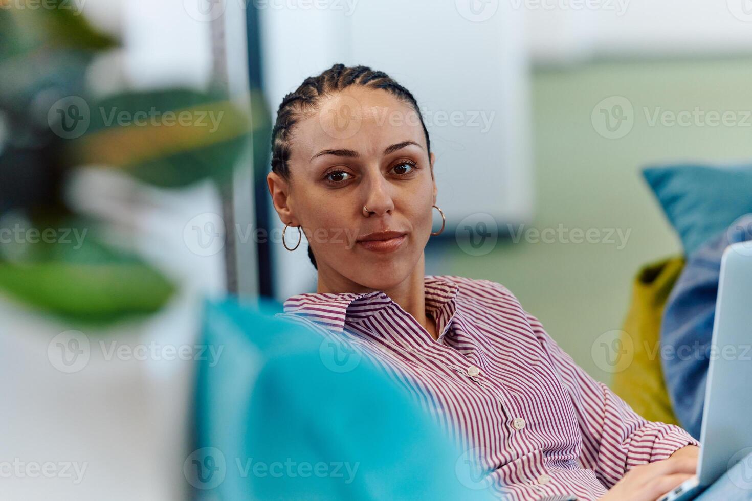 A modern programmer discussing future business projects with colleagues in a modern startup office photo