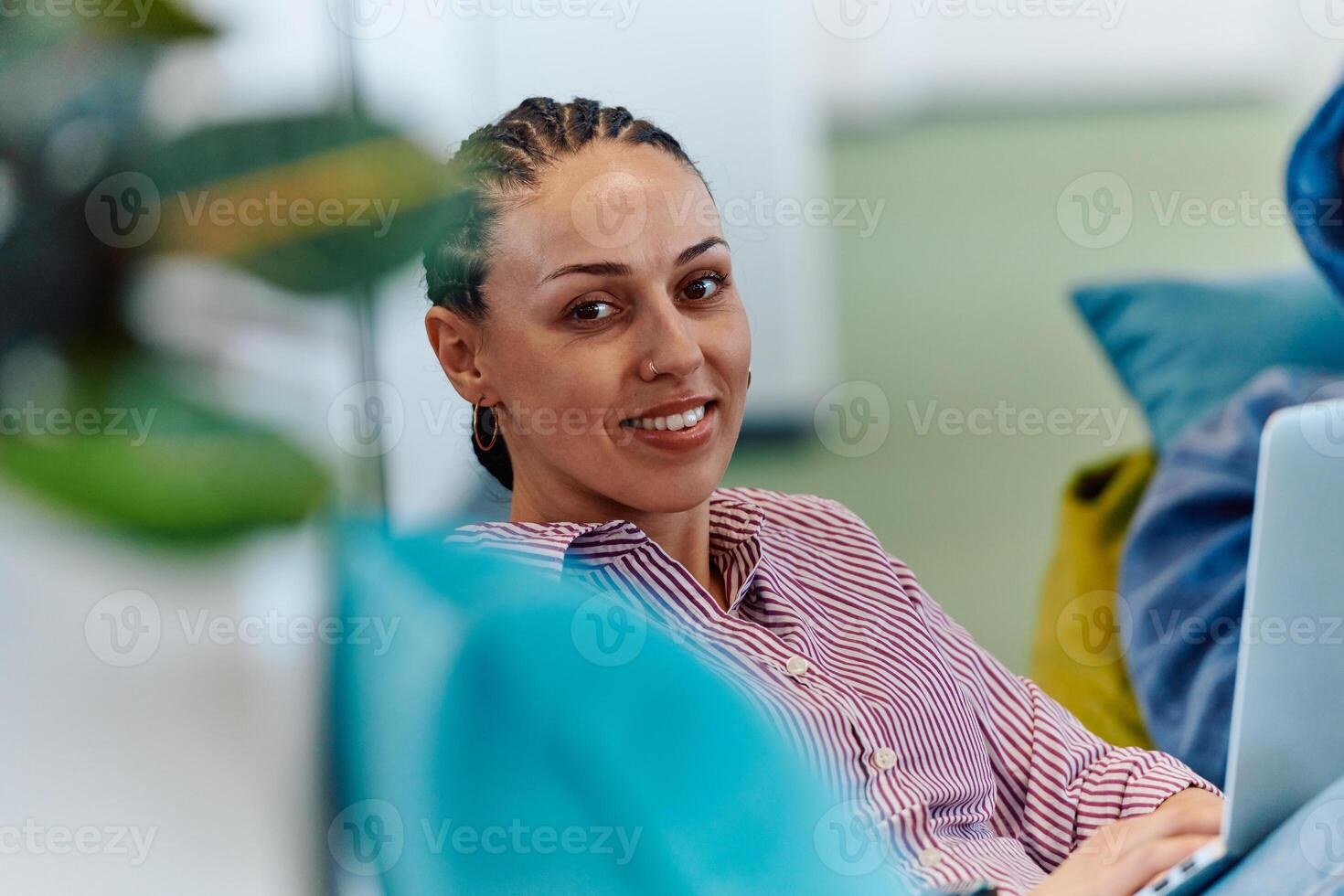 A modern programmer discussing future business projects with colleagues in a modern startup office photo
