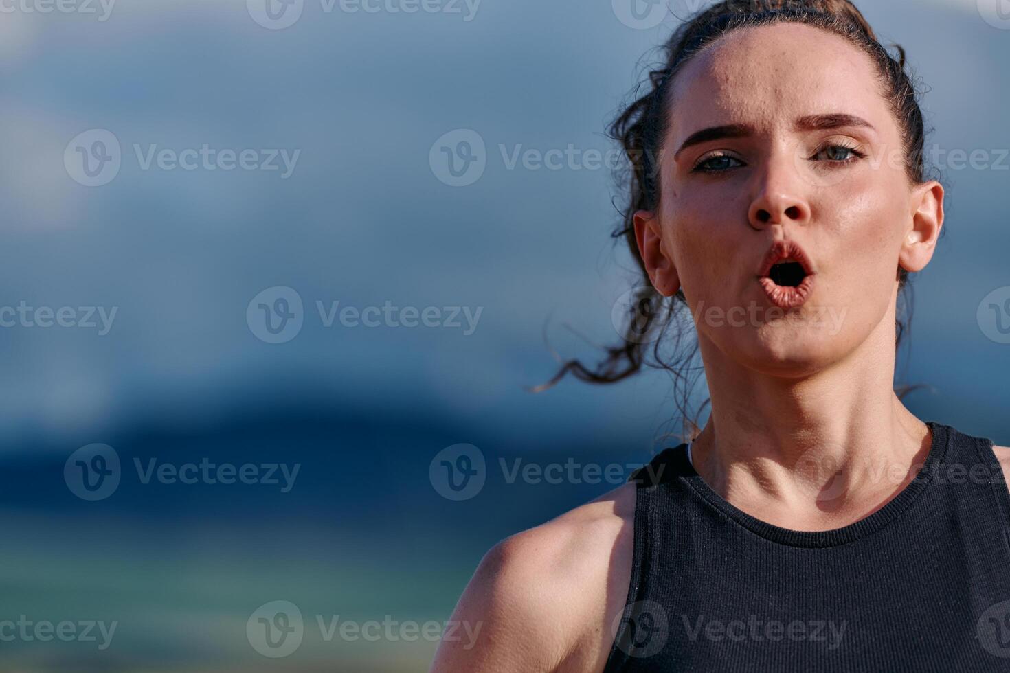 Woman Resting After Intense Run photo