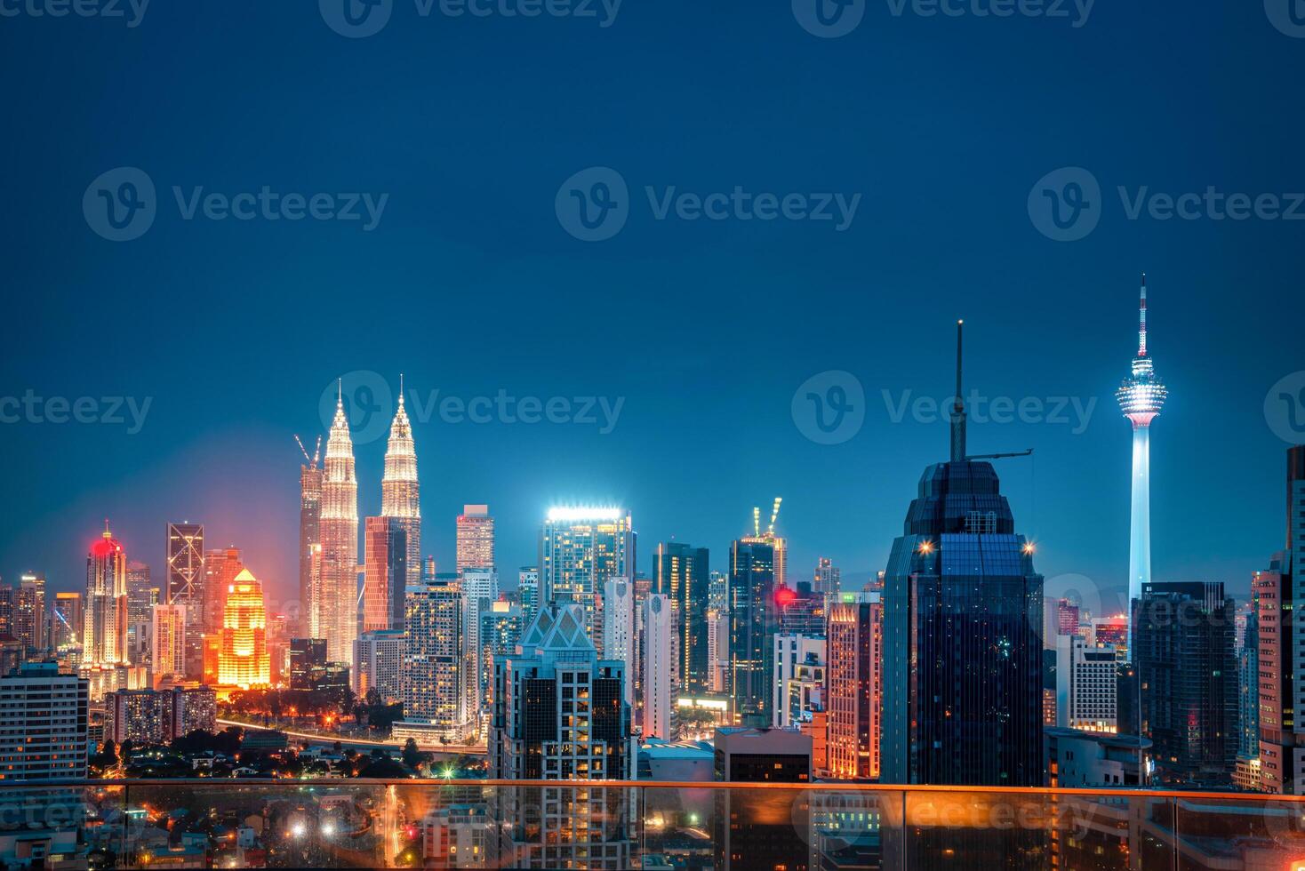 Cityscape of Kuala lumpur city skyline at night in Malaysia. photo