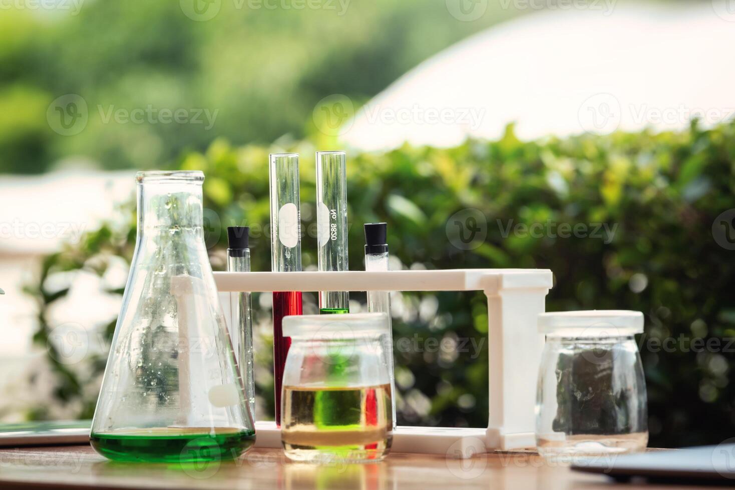 Test tubes with colorful chemical on table. Science chemistry concept. photo