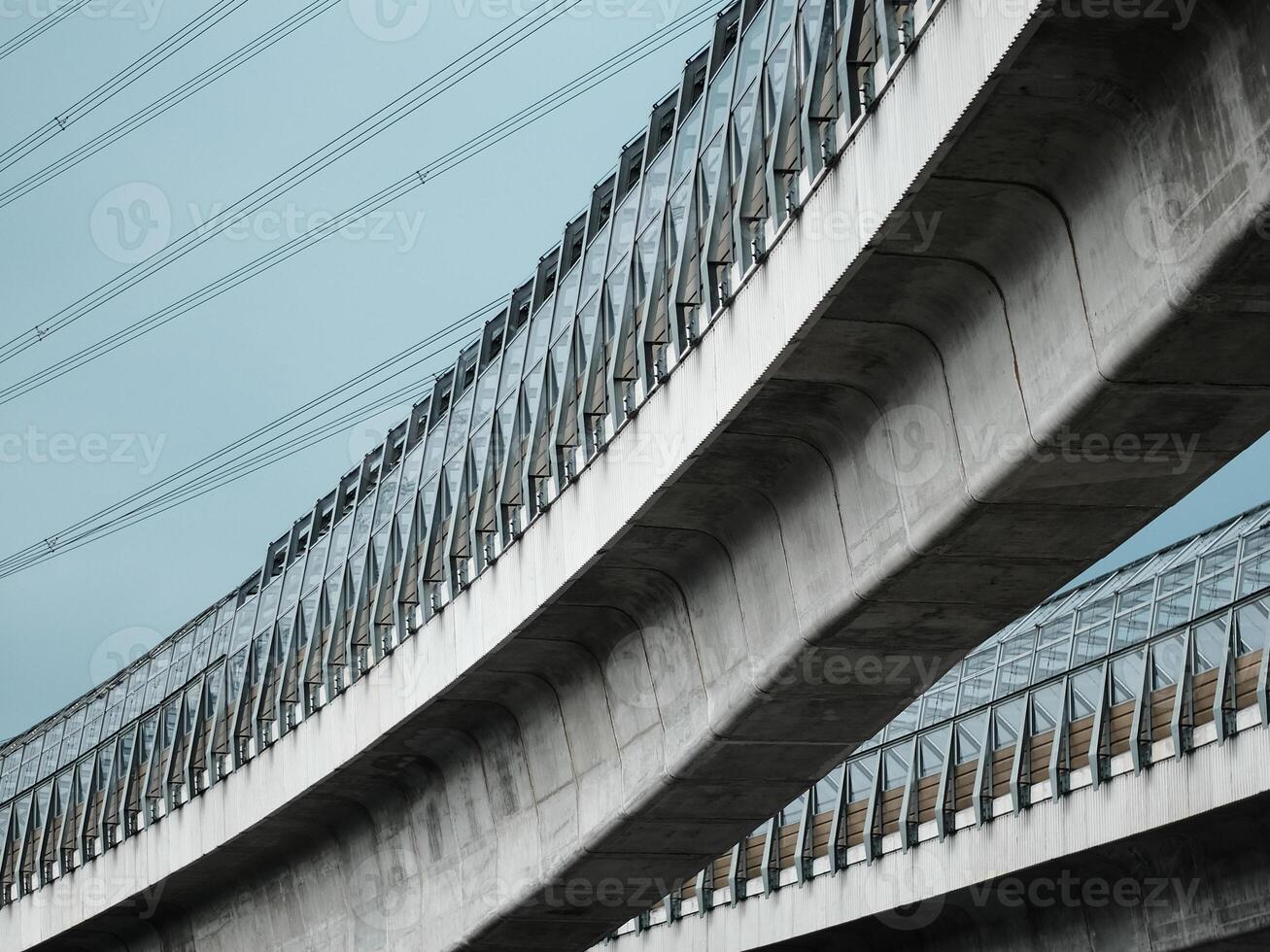 Low angle view of elevated train tracks photo