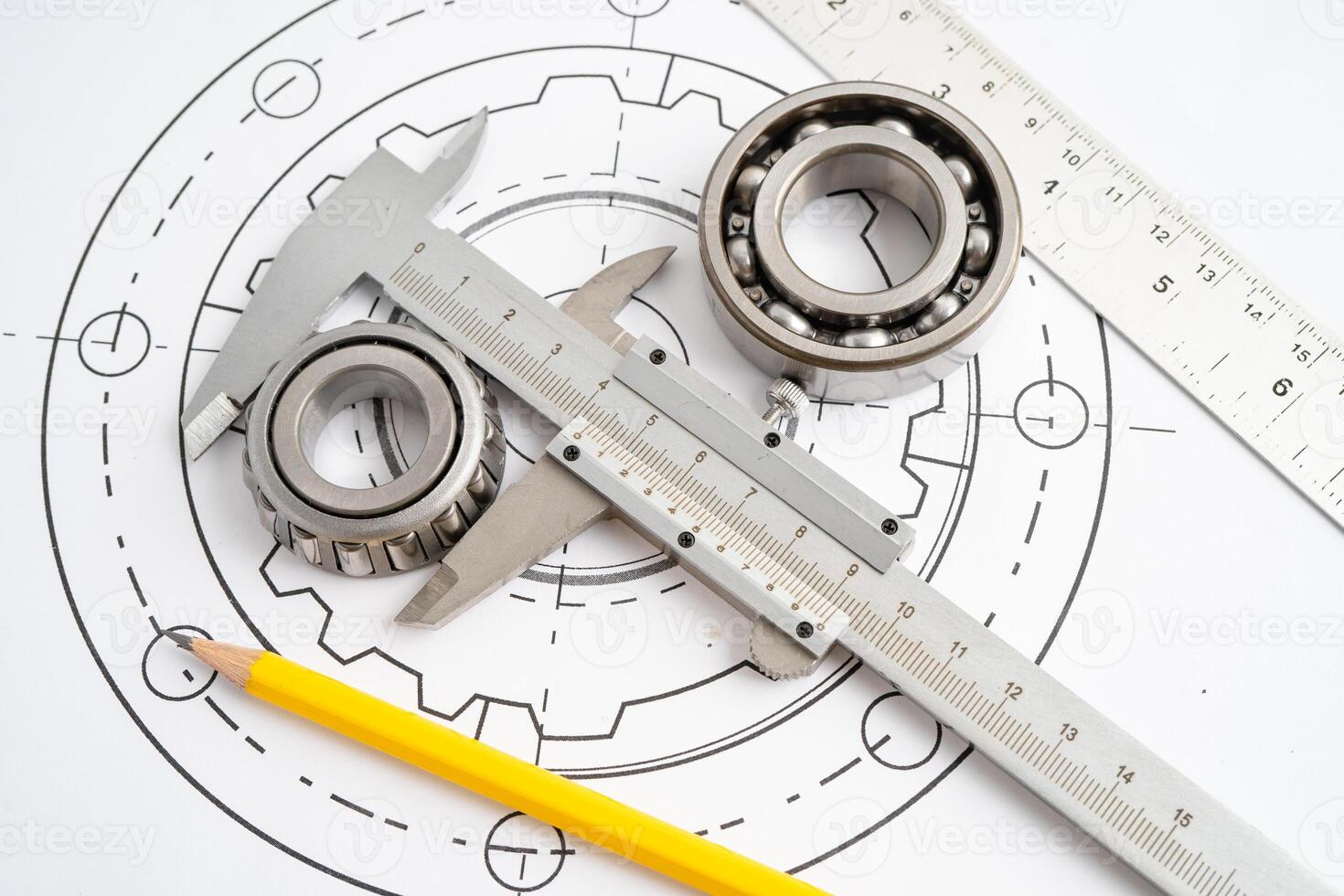 Engineering tools and mechanical industrial with vernier caliper and metal ball bering. photo