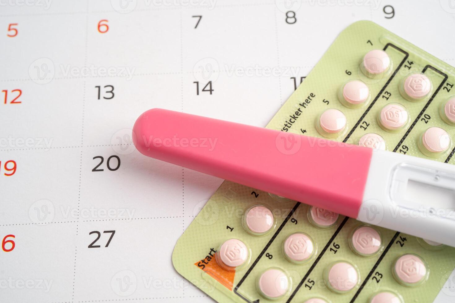 Pregnancy test and birth control pills, contraception health and medicine. photo