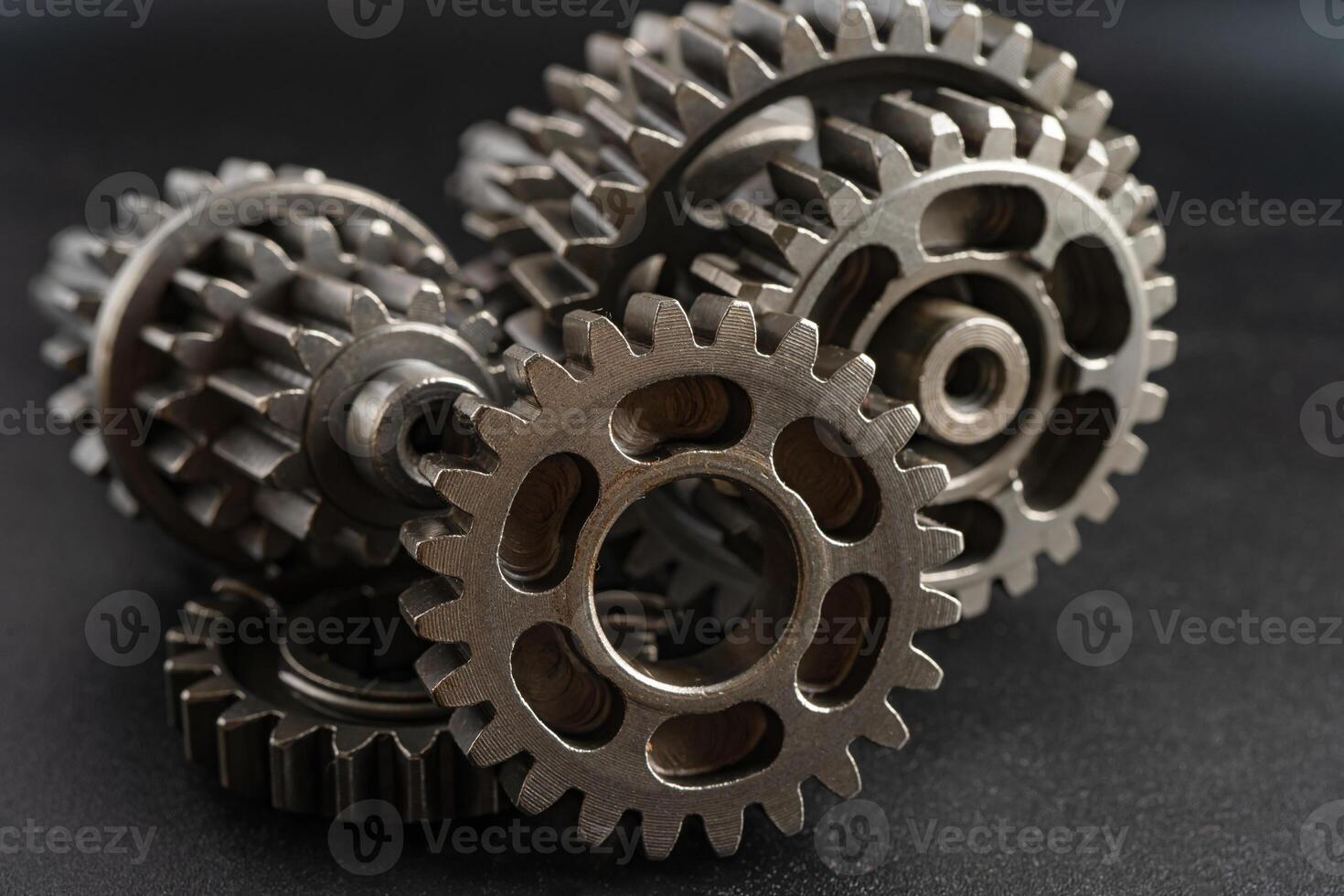 Gear and cogs wheels, clock mechanism, brass metal engine industrial. photo
