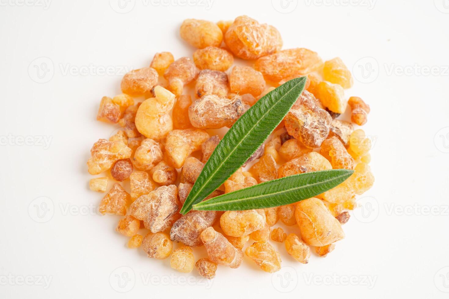Frankincense or olibanum aromatic resin isolated on white background used in incense and perfumes. photo