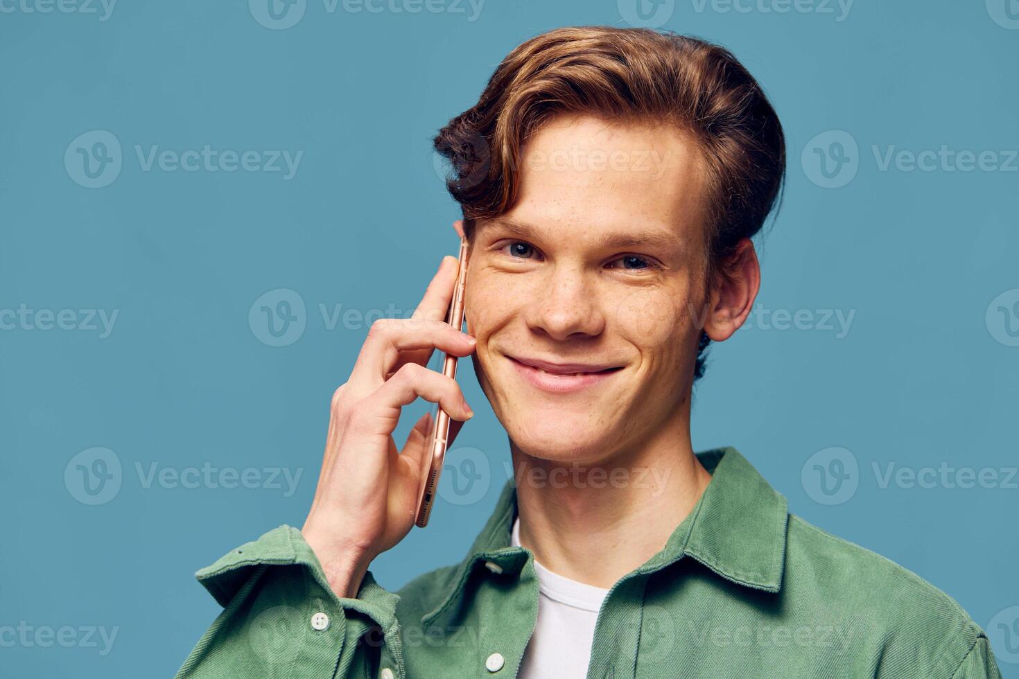 Dashing Young Businessman. A Modern Portrait of Confidence and Style with a Smartphone photo