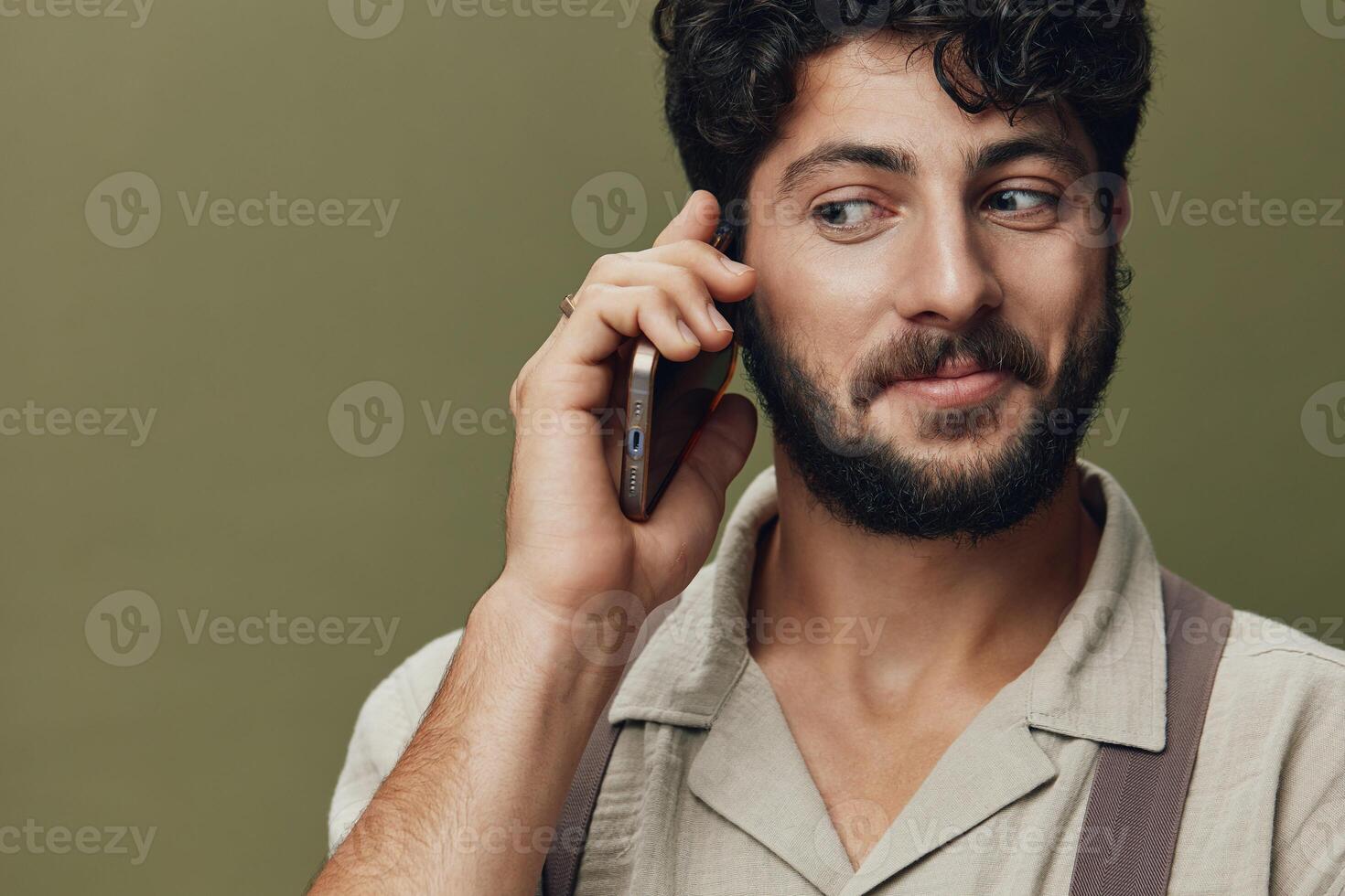 Man mobile handsome guy face confident adult communication beard happy fashion casual person photo