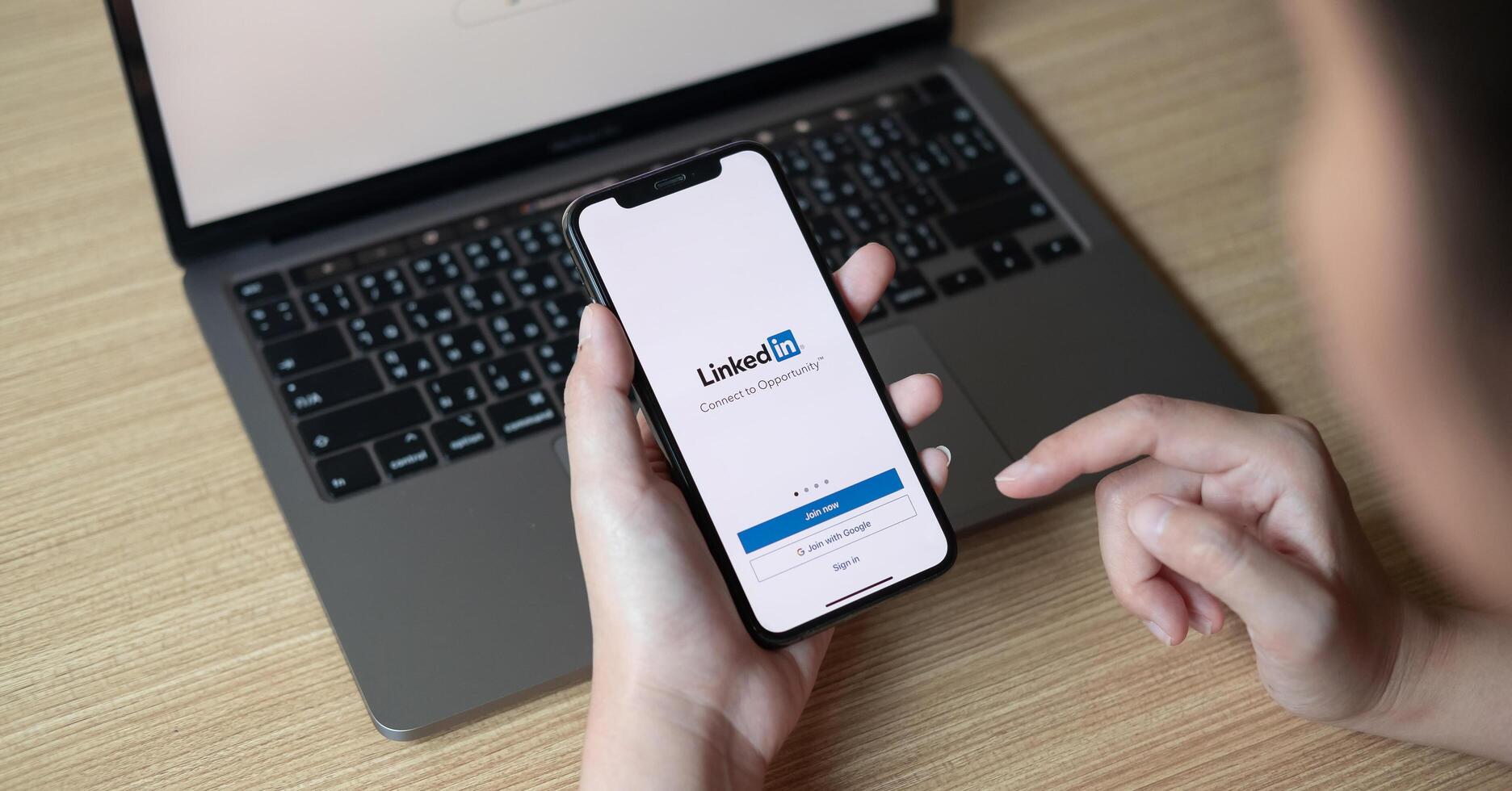 CHIANG MAI, THAILAND - JUNE 22, 2020. iPhone Xs with LinkedIn application on the screen. LinkedIn is a business-oriented social networking service photo
