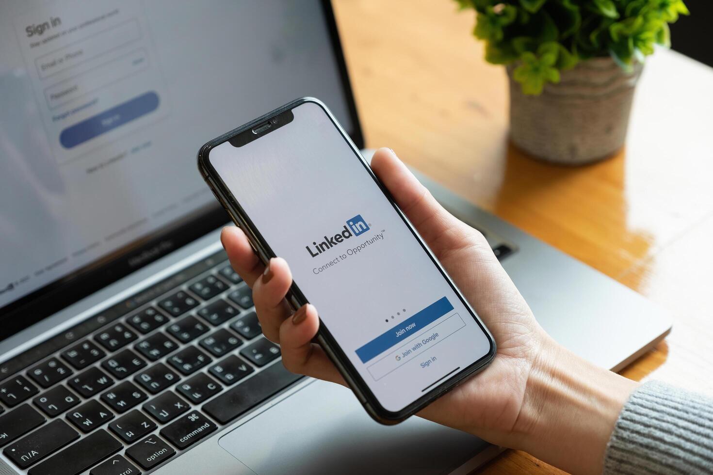 CHIANG MAI, THAILAND - OCT 17, 2021. iPhone x with LinkedIn application on the screen. LinkedIn is a business-oriented social networking service photo