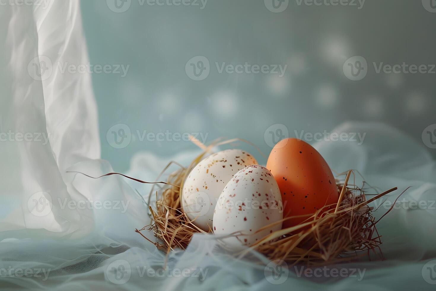 Painted Easter eggs in a nest on fabric in the rays of the morning spring sun, pastel turquoise blue background, Happy Easter day concept and idea photo