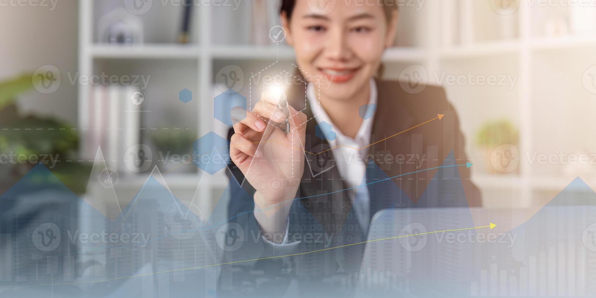 Businesswoman draw growth graph and progress of business and analyzing financial and investment data, development of success, business planning and strategy photo