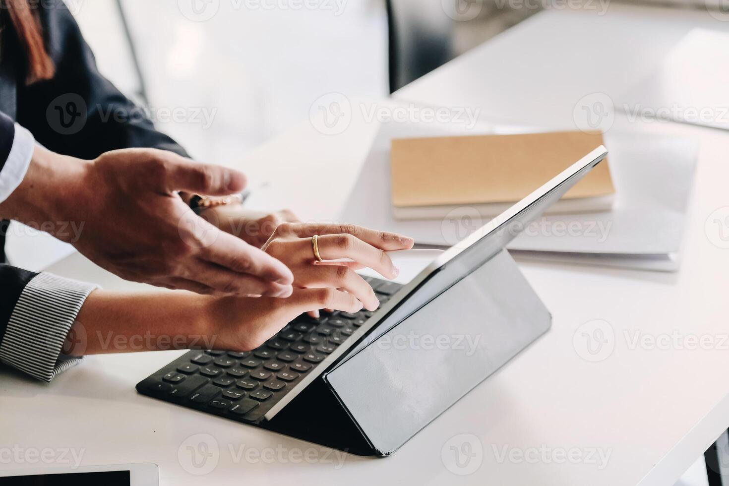 Two business team discussing new plan financial graph data on office table photo