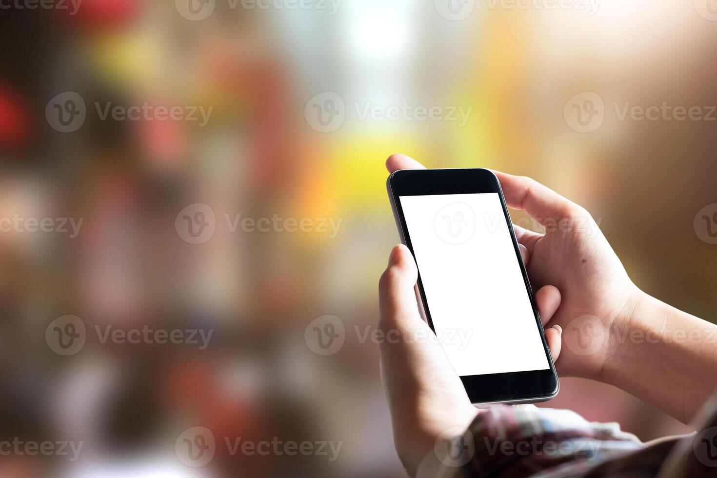 Close up Woman hand Using a Smart Phone with blur background photo
