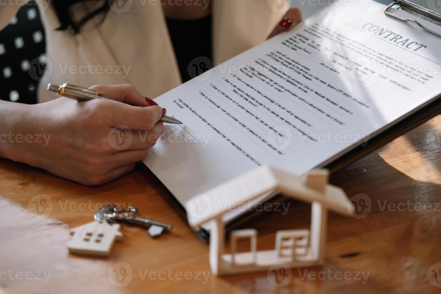Real estate agent offer hand for customer sign agreement contract signature for buy or sell house. Real estate concept contact agreement concept photo