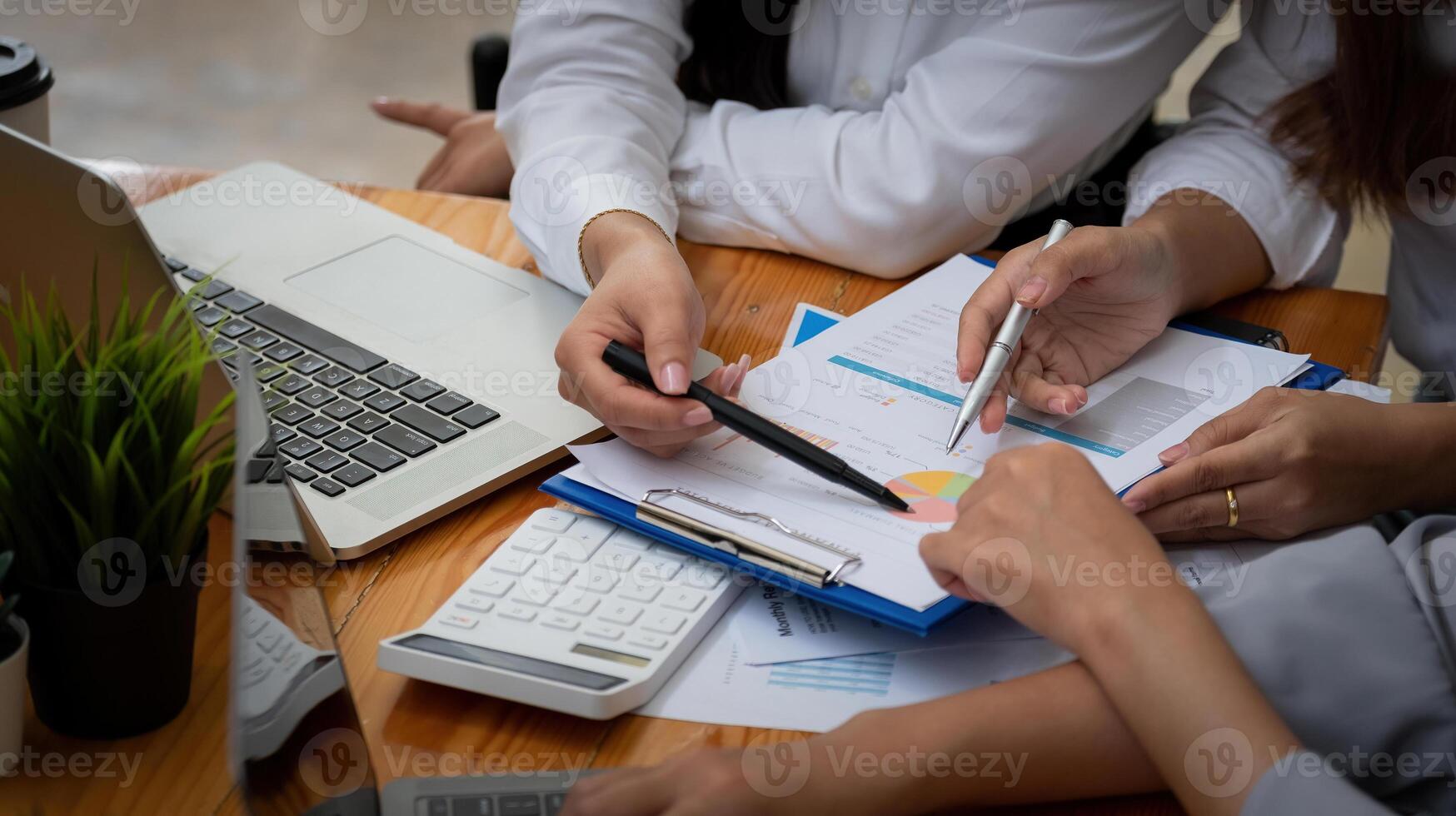 Business People Analyzing Statistics Business Documents, Financial Accounting Concept. photo