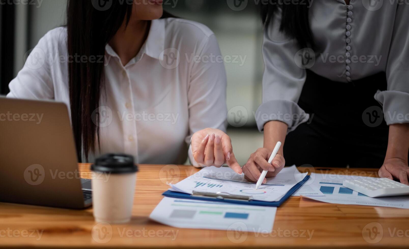 Business adviser analyzing financial figures denoting the progress in the work, consult concept photo