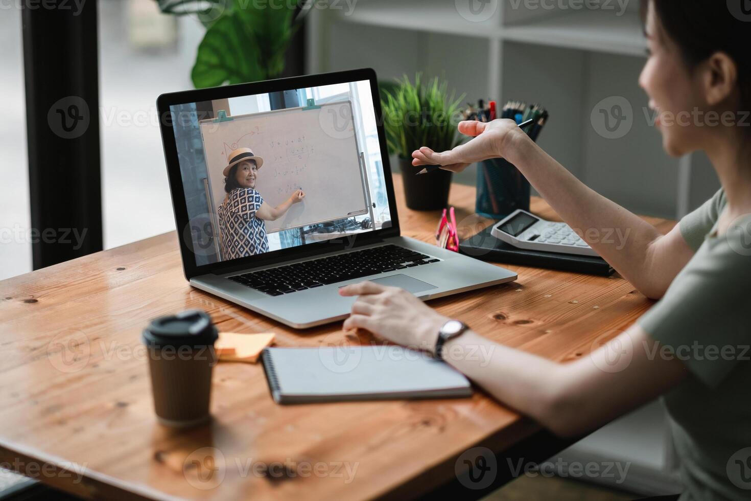 call, online business meeting, briefing. Successful asian freelancer waving hand and greeting colleagues during conference. Distant work, online learning. photo