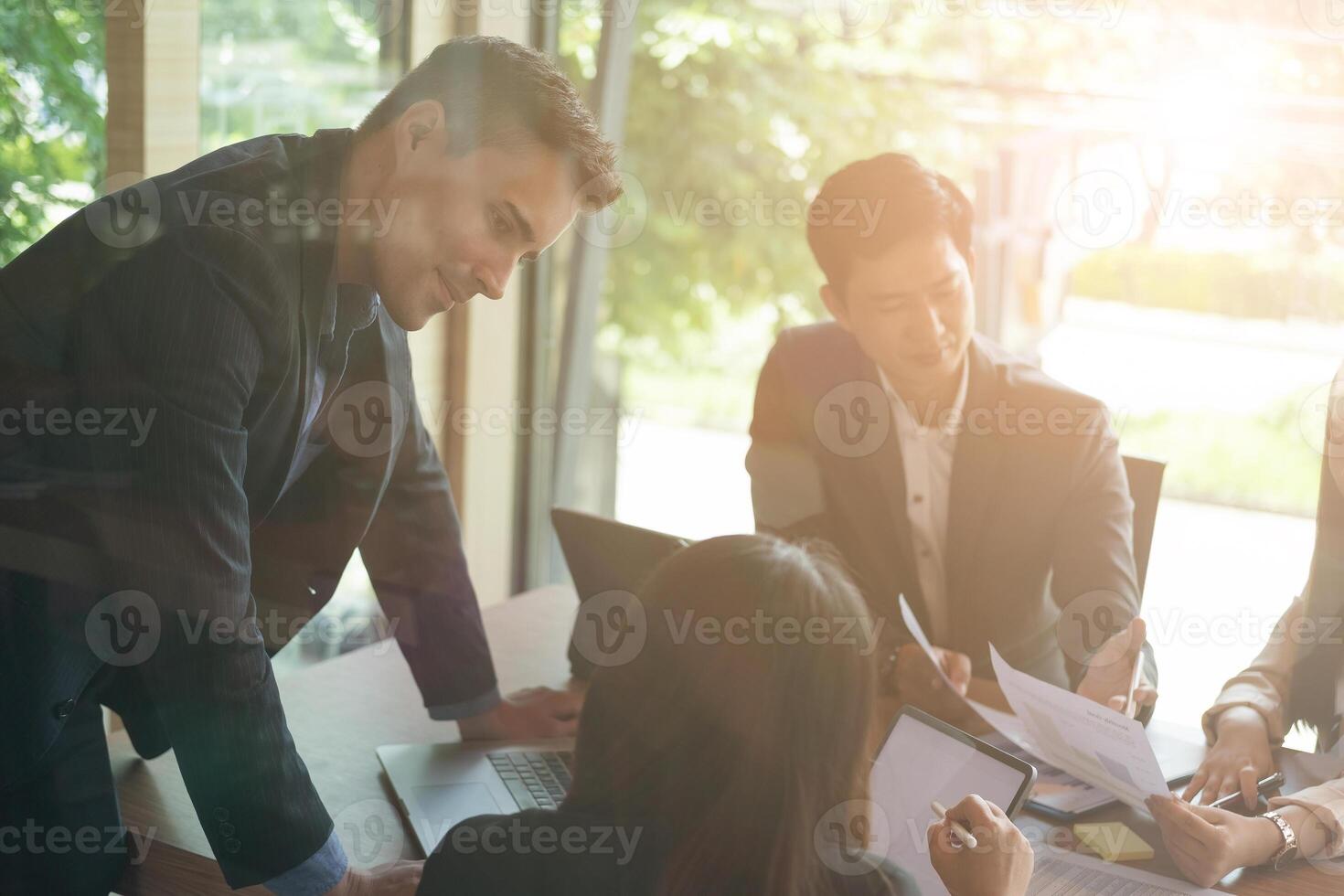 Business team working new startup project and discussing the charts and graphs showing the results at meeting accounting and financial. photo