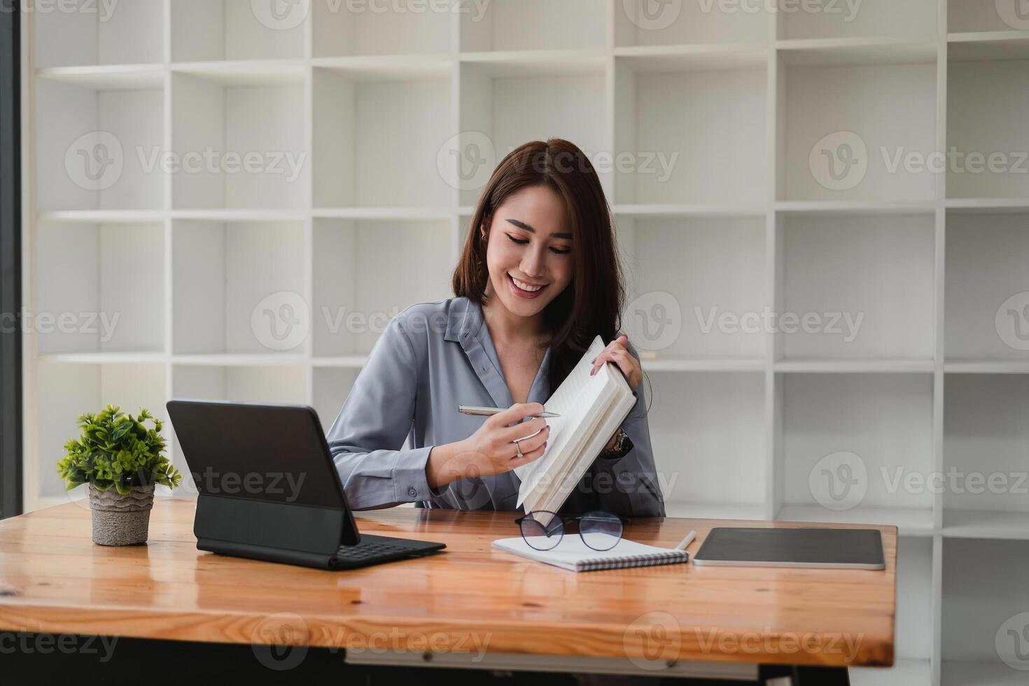Young asian teacher giving online lessons conference calling on digital tablet talk by webcam learn teach in online chat, distance webinar online teaching concept photo