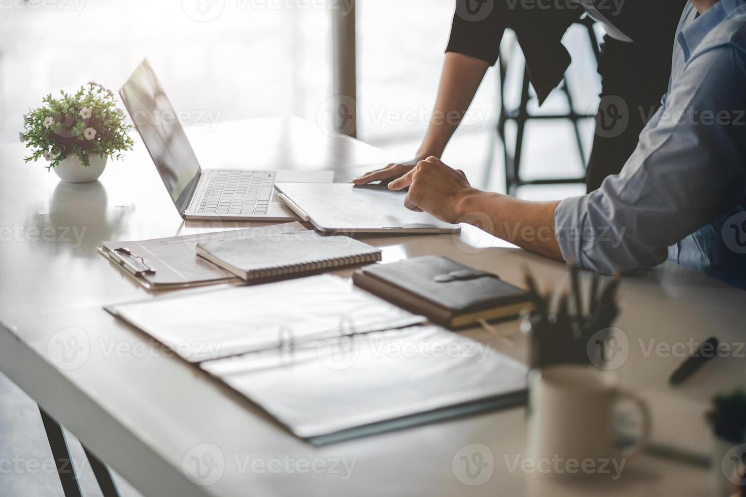 Business People Talking Discussing with coworker planning analyzing financial document data charts and graphs in Meeting and successful teamwork Concept photo
