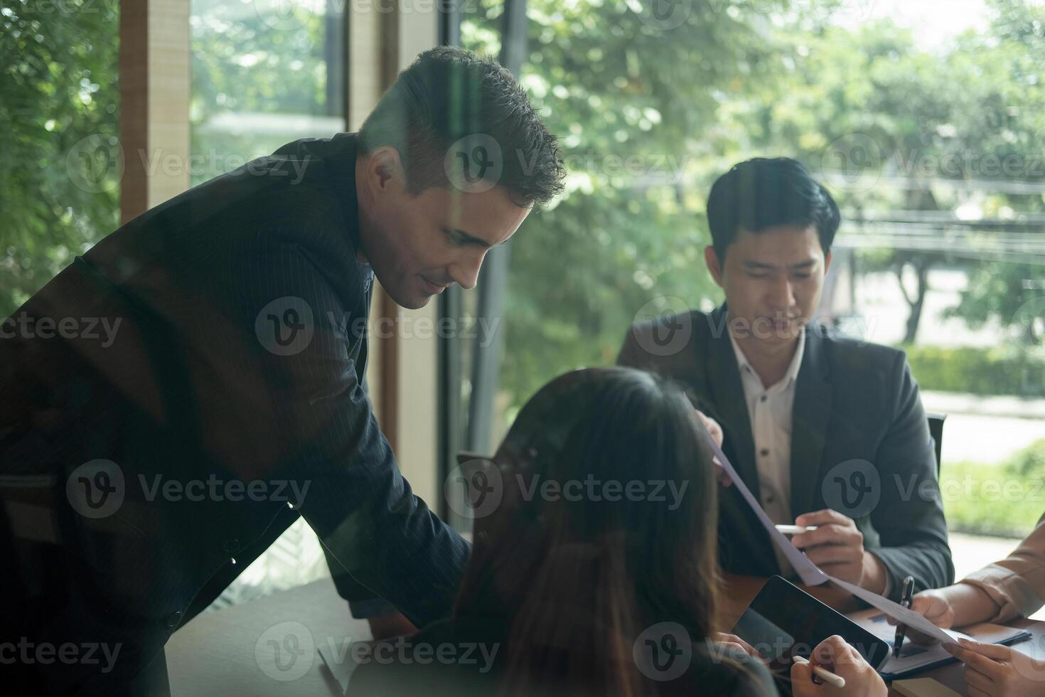 Diversity group of business people are meeting to analyze data for marketing plan, Financial advisor teamwork and accounting concept photo
