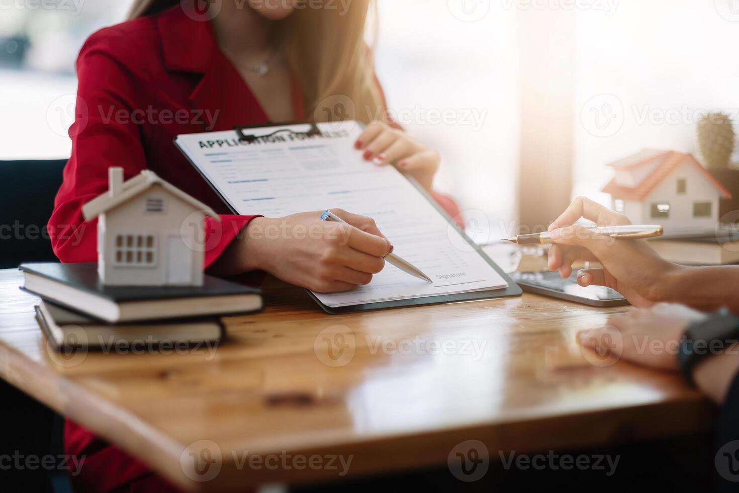 Client sign the documents to make the contract legally, Home sales and home rental real estate concept photo