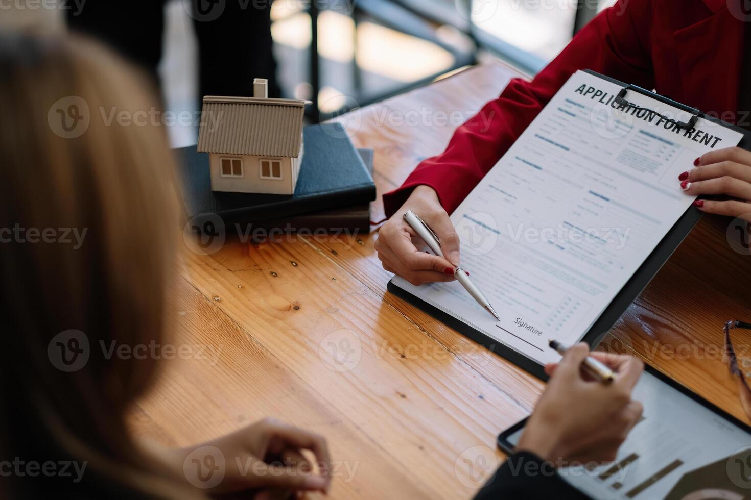 Client sign the documents to make the contract legally, Home sales and home rental real estate concept photo