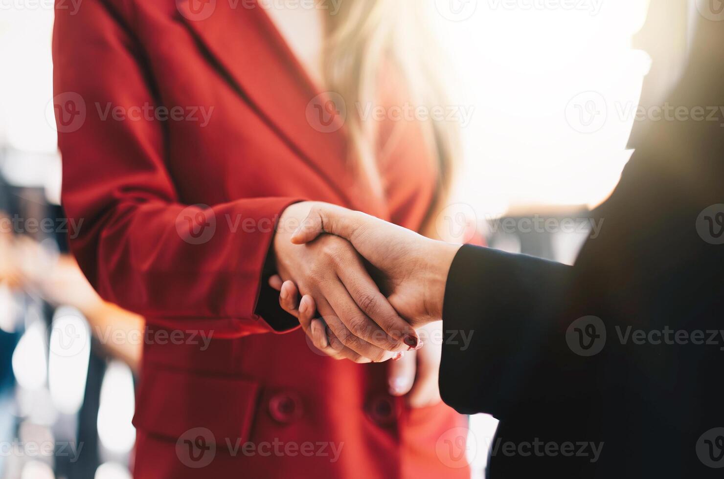 two businessman shake hands as hello in office closeup. Friend welcome, introduction, greet or thanks gesture, product advertisement, partnership approval, strike a bargain on deal concept photo