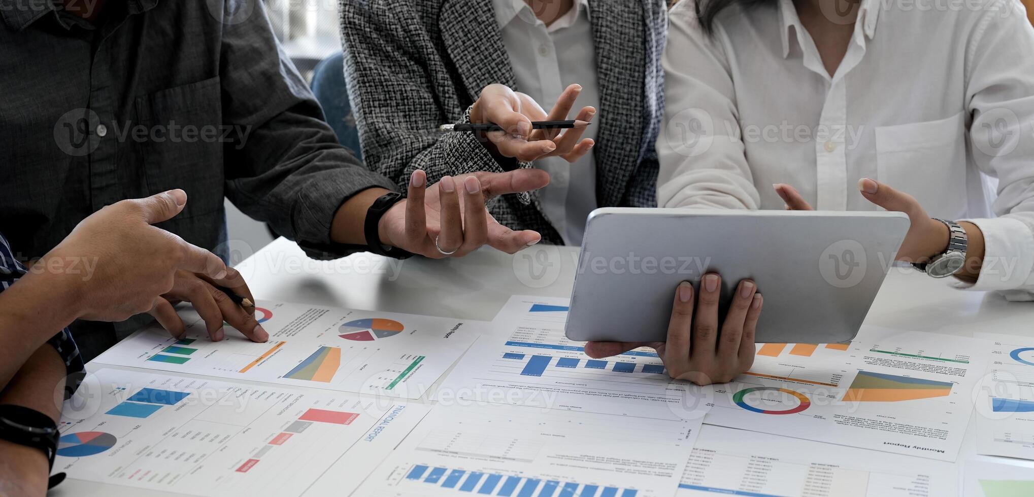 Financial,accounting, investment advisor consulting with her team at office. Teamwork Meeting Concept photo