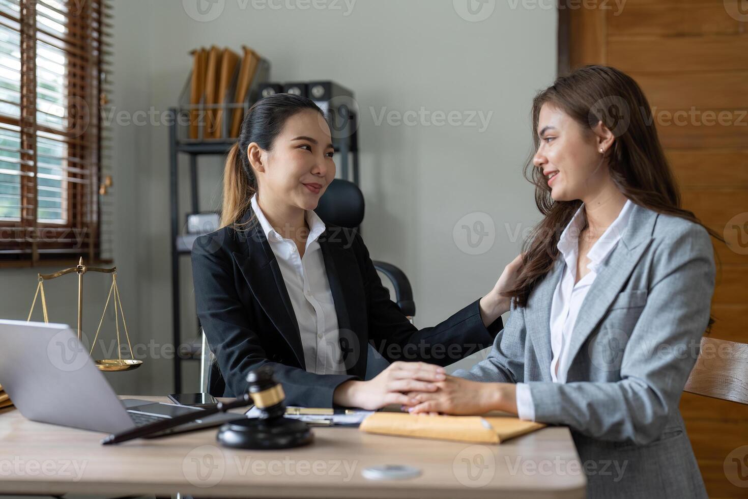 Justice and attorney concept. Lawyer meeting and consoling solution to his client provide legal advice and trust commitment strain serious for problem photo